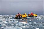 Visitors in Zodiac inflatable boats pass through a sea of brash ice on their way to visit Point Wild off Elephant Island at the northeast end of the South Shetland Islands.