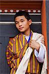 Young boy watching the masked dancing at Trashi Chhoe Dzong, a monastery now also housing the secretariat, the throne room and offices of the King.