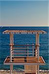 Nice,Provence-Alpes-Cote d'Azur, France. Life guard tower on Nice beach looking out towards the Mediterranean Sea