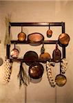 Italy, Tuscany, Lucca. Old kitchen utensils on display in a museum