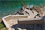 Steps down to a small beach near La Condamine, Pointe de la Poudriere, Monaco.