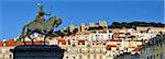 The historical centre and the Sao Jorge castle, with King Dom Joao I equestrian statue. Lisbon, Portugal