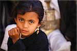 Yemen, Sana'a Province, Haraz Mountains, Jebel Shugruf. A young girl  in traditional clothing.