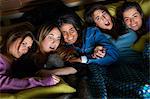 Women watching scary movie together