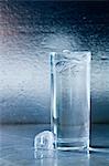 Glass of water with ice cubes