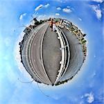 A couple in Zaanse Schans, Netherlands, little planet effect