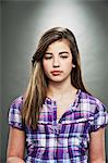 Portrait of young teenage girl, studio shot