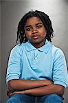 Portrait of black teenage boy, studio shot