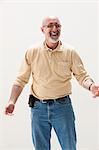 Mature man smiling, studio shot