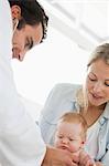 Doctor checking his cute little patient