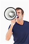 Megaphone held by a furious man against a white background