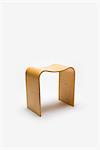 Bent birch plywood stool, 1998. Designer: Corin Mellor
