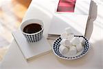 Tea And Cylindrical Sugar Cubes On Table