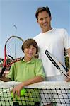 Father and Son at Tennis Net, portrait