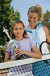 Mother and Daughter at Tennis Net with Trophy, portrait