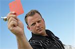Soccer Referee Showing Red Card