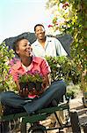 Couple choosing plants at nursery