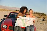Women Looking at Road Map