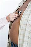 Overweight Man in Medical Examination
