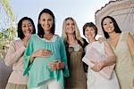 Women standing outside celebrating a Baby Shower