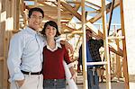 Couple on new home building site