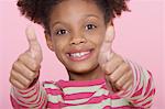 Young Girl smiling, Giving Thumbs Up