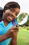 Girl Using Magnifying Glass