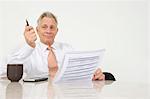 Businessman Holding Paperwork