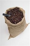 Sack of coffee beans with spoon