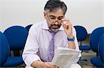 Businessman Reading Newspaper