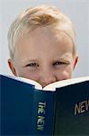 Boy Reading The New Testament
