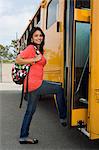 Teenage Girl Getting on School Bus