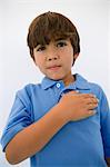 Boy with Hand Over Heart