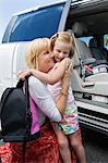 Mother Driving Daughter to School