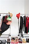 Fashion hats and accessories on clothes rail