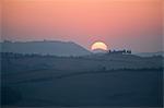 Sunset over the hills of Val d'Orcia, UNESCO World Heritage Site, Tuscany, Italy, Europe
