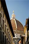 A view of the Duomo through old buildings in Florence, UNESCO World Heritage Site, Tuscany, Italy, Europe