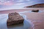 Rockpools on the sandy beach at Dunraven Bay, Southerndown, Glamorgan, Wales, United Kingdom, Europe