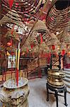 Incense coils hang from the roof of the Man Mo Temple, built in 1847, Sheung Wan, Hong Kong, China, Asia