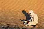 Beduin reading the Koran in the Sahara, Douz, Kebili, Tunisia, North Africa, Africa