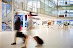 Blurred view of business people in lobby