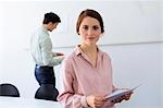 Businesswoman smiling in office