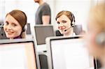 Businesswomen working in headsets