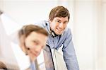 Businessman wearing headset in office