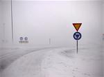 Road signs in snowy landscape