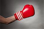 Hand wearing boxing glove