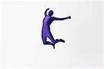 Man in bodysuit jumping for joy