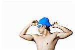 Swimmer putting on swimming cap