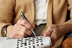 Senior woman doing crossword