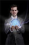 Man holding holographic information ball